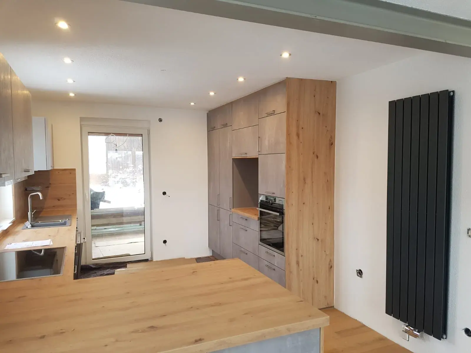 Rustikale Küche mit Holzfronten